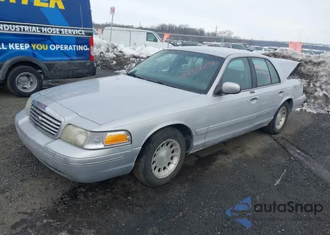 1999 Ford Crown Victoria Lx z USA, uszkodzony, nr VIN 2FAFP74W2XX158435